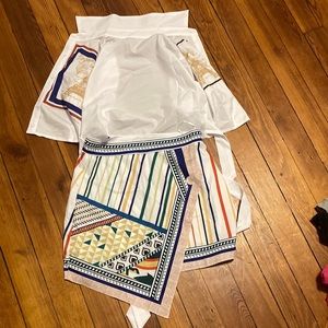 im selling this jamaican looking cropped shirt and skirt the size is large woman